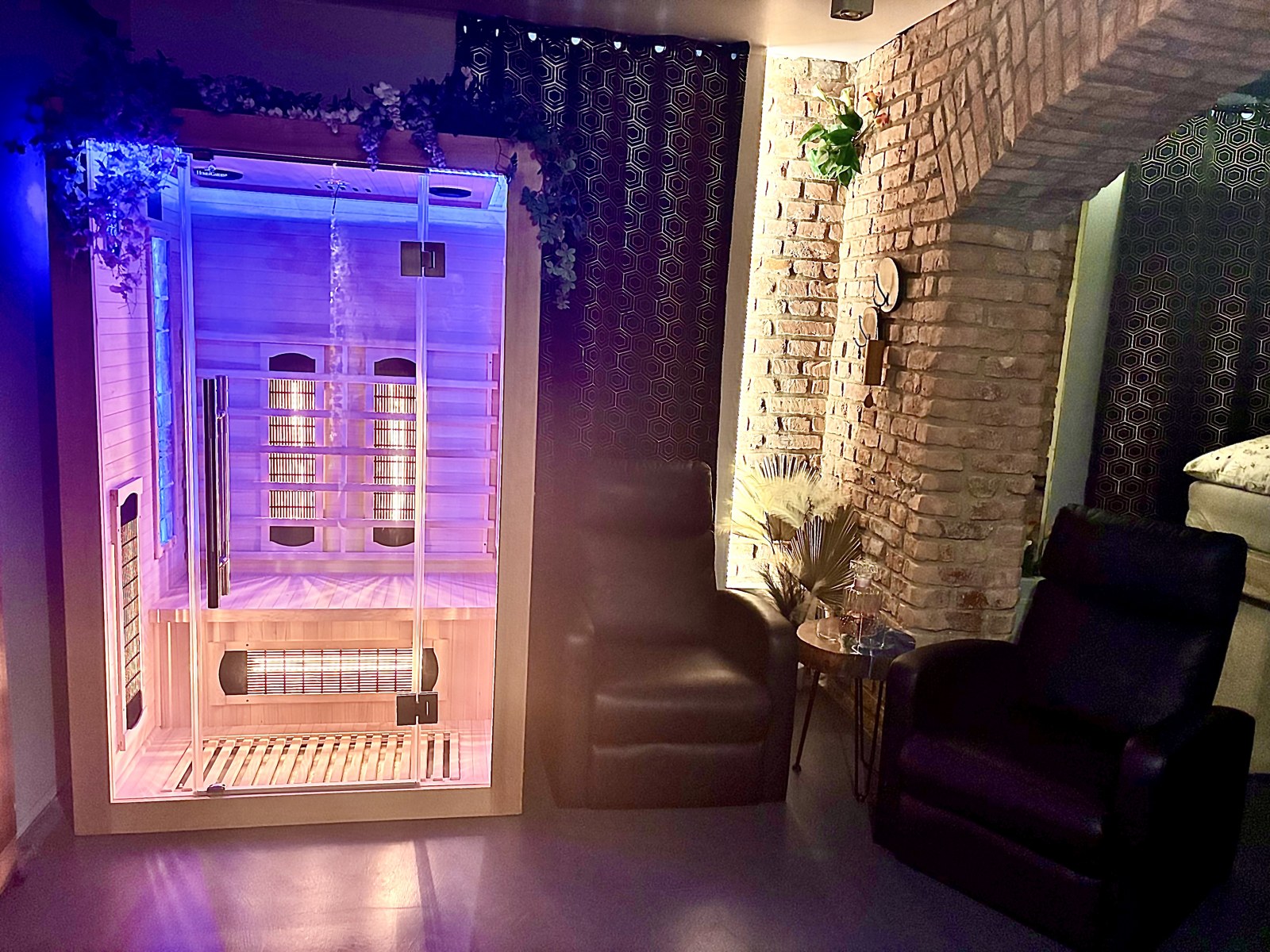 Infrared sauna cabin with blue lighting and exposed brick wall — Property Presentation Reset, Poznań apartment